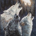 cross stitch in harmony with wolves howling at night moon, stars, snow
