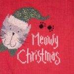 cross stitch meowy christmas holiday on red, cat prints, green hat and bow tie