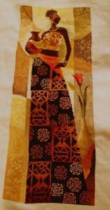 cross stitch naima, african lady, geometric shapes on dress, cultural design