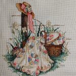 cross stitch pink ribbon quilt in basket, fence post, bonnet pink ribbon