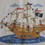 cross stitch pirate ship, flags, water