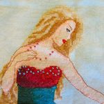 cross stitch queen of water with elegant lady long green dress, model stitching