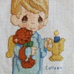 cross stitch charity quilt boy holding candle and teddy bear