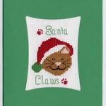 cross stitch santa claws christmas card with holiday cat