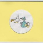 cross stitch stork with baby for card
