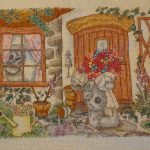 cross stitch cottage scene by tatty teddy, teddy bear with bouquet of flowers at door