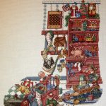 cross stitch toys and games christmas stocking, vintage holiday, room with shelves of toys. better homes & garden heirloom