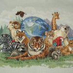 cross stitch universal unity with earth globe and zebra, raccoon, tiger, squirrel, deer, bear, ram, eagle, giraffe, bird , tiger, mountains