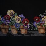 cross stitch pansy pot, black fabric, colorful pansies flowers in pots