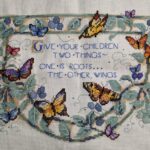 cross stitch roots and wings, give your children, butterflies and green leaves